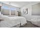 Bedroom featuring carpet, a bed, and large windows allowing lots of natural light at 11053 Bright Sky Cir, Littleton, CO 80125