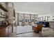 Spacious living room showcases a fireplace, wood floors and an open layout at 11053 Bright Sky Cir, Littleton, CO 80125