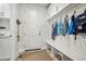 Mud room featuring built-in bench, coat hooks, and storage cabinets at 11053 Bright Sky Cir, Littleton, CO 80125