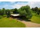 Aerial perspective of the property featuring lush greenery and mature trees at 1016 Stearns Ave, Boulder, CO 80303