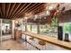 Eat-in kitchen with long breakfast bar with sink and views of the backyard at 1016 Stearns Ave, Boulder, CO 80303