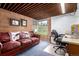 Cozy office area features a comfortable couch, desk, and view of the property at 1016 Stearns Ave, Boulder, CO 80303