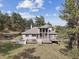 This home has a multi-level deck/patio great for entertaining while enjoying the scenic outdoors at 30444 Ruby Ranch Rd, Evergreen, CO 80439