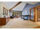 Spacious office with vaulted ceilings, natural light, and built-in storage at 30444 Ruby Ranch Rd, Evergreen, CO 80439