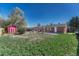 Spacious backyard with grass and shed at 8325 Elati St, Denver, CO 80221