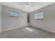 Bright bedroom with natural light and neutral tones at 8325 Elati St, Denver, CO 80221