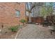 Private backyard oasis with stone groundcover, mature trees, and outdoor seating area at 3132 E 17Th Ave # B, Denver, CO 80206