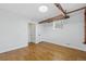 Basement featuring wood floors and pipes at 3132 E 17Th Ave # B, Denver, CO 80206