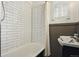 Bathroom featuring a white shower and tile floors at 3132 E 17Th Ave # B, Denver, CO 80206