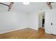 Bright bedroom features hardwood floors and an ensuite bathroom, offering comfort and convenience at 3132 E 17Th Ave # B, Denver, CO 80206