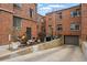 Charming courtyard with seating, dining, a grill, and a garage with entry, creating a versatile outdoor space at 3132 E 17Th Ave # B, Denver, CO 80206