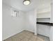 Bedroom featuring tile floors and white paint at 3132 E 17Th Ave # B, Denver, CO 80206