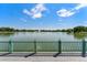 Picturesque water view with fountain surrounded by lush greenery under a beautiful blue sky at 3132 E 17Th Ave # B, Denver, CO 80206