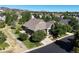 Aerial view of home showcasing roof, landscaping, and the surrounding neighborhood at 6699 S Robb St, Littleton, CO 80127