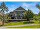 Well-maintained backyard with green grass and mature trees creating a private retreat at 6699 S Robb St, Littleton, CO 80127