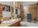 Bathroom with stylish tile, modern fixtures, and shower creates a spa-like experience at 6699 S Robb St, Littleton, CO 80127