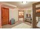 A lovely bedroom with a makeup station, and a comfortable carpet at 6699 S Robb St, Littleton, CO 80127