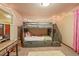 A lovely bedroom with a bunk bed, and a comfortable carpet at 6699 S Robb St, Littleton, CO 80127