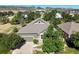 Charming single-Gathering home featuring lush landscaping, attached two car garage, and mountain views at 6699 S Robb St, Littleton, CO 80127