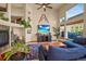Bright living room with hardwood floors, high ceilings, expansive windows, and modern decor at 6699 S Robb St, Littleton, CO 80127
