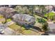 Residential property showcasing a well-manicured lawn, mature trees, and a charming fenced yard at 10429 Quivas St, Northglenn, CO 80234