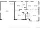 First floor plan showcasing the layout of the living room, kitchen, bedrooms, and garage at 10429 Quivas St, Northglenn, CO 80234