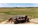 Aerial view of a home on expansive land with mountain views, showcasing the property's privacy and scenic location at 2710 Rustlers Canyon Loop, Elizabeth, CO 80107
