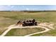 Aerial view of a home with surrounding landscapes, highlighting its secluded location and long winding driveway at 2710 Rustlers Canyon Loop, Elizabeth, CO 80107