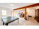 Spacious basement offering endless possibilities with natural light and exposed beams at 2710 Rustlers Canyon Loop, Elizabeth, CO 80107