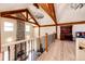 Spacious bonus room with wood floors, a vaulted ceiling, and natural light at 2710 Rustlers Canyon Loop, Elizabeth, CO 80107