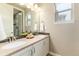 Bright bathroom featuring double vanity, modern lighting and granite countertops at 16549 Prospect Ln, Broomfield, CO 80023