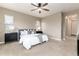 Spacious bedroom featuring many windows, ceiling fan, and neutral decor at 16549 Prospect Ln, Broomfield, CO 80023