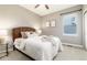 Relaxing bedroom featuring a ceiling fan, one window and natural decor at 16549 Prospect Ln, Broomfield, CO 80023