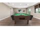 Entertainment area with a pool table and natural light at 16549 Prospect Ln, Broomfield, CO 80023