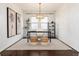 Stylish home office with dark wood floors, decorative lighting, and a neutral color scheme at 16549 Prospect Ln, Broomfield, CO 80023