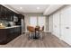 Kitchen area featuring modern stainless steel appliances and a table for seating at 16549 Prospect Ln, Broomfield, CO 80023