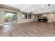 This living room features wood floors, recessed lighting, and easy access to the backyard at 16549 Prospect Ln, Broomfield, CO 80023