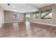 The living room features wood floors, recessed lighting, and access to outdoor living space at 16549 Prospect Ln, Broomfield, CO 80023
