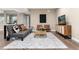 Comfortable living space with contemporary decor, including a stylish area rug at 16549 Prospect Ln, Broomfield, CO 80023