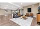 Spacious entertainment area featuring a comfortable seating and modern decor at 16549 Prospect Ln, Broomfield, CO 80023