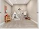 Bright room with a teepee, carpet with letters and decor on wall at 16549 Prospect Ln, Broomfield, CO 80023