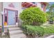 Building exterior with landscaped entry, showcasing the well-maintained property at 12131 Melody Dr # 201, Denver, CO 80234