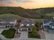 An aerial view showing the proximity of the home to open space and greenbelt and neighborhood homes at 1133 Lucky Ct, Castle Rock, CO 80109
