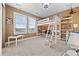 ' bedroom features a lofted bed, built-in shelving for storage, and playful decor creating a fun and functional space at 1133 Lucky Ct, Castle Rock, CO 80109
