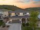 Beautiful two-story home features a two-car garage, inviting front porch, and professional landscaping for curb appeal at 1133 Lucky Ct, Castle Rock, CO 80109