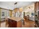 Modern kitchen island and open floorplan at 1133 Lucky Ct, Castle Rock, CO 80109