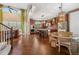 Open floor plan showcasing the spacious kitchen and adjacent dining area with lots of natural light at 1133 Lucky Ct, Castle Rock, CO 80109