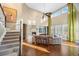 Beautiful living room with high ceilings, fireplace, and lots of natural light at 1133 Lucky Ct, Castle Rock, CO 80109