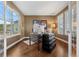 Bright office featuring hardwood floors, natural light, and a modern desk with a computer at 1133 Lucky Ct, Castle Rock, CO 80109