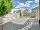 Backyard with gravel and artificial grass, enclosed by a wooden fence at 8018 Williams Fork Ave, Littleton, CO 80125